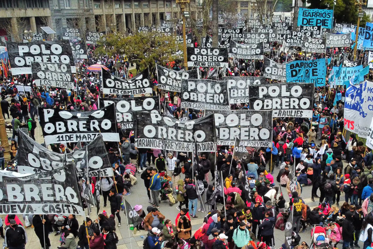 Members of social organizations protests on July 14, 2022 in Plaza de Mayo square in front of Casa Rosada presidential palace in Buenos Aires, Argentina. (Photo by Luis ROBAYO / AFP) (Photo by LUIS ROBAYO/AFP via Getty Images)