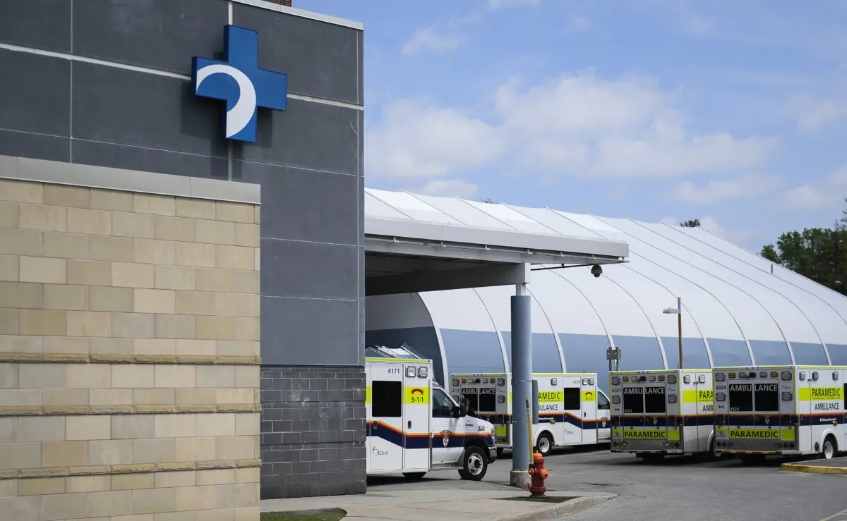 Ambulances are parked outside the Emergency Department at the Ottawa Hospital Civic Campus in Ottawa on May 16, 2022. (Justin Tang/The Canadian Press)