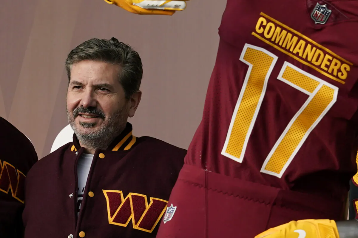 Washington Commanders' Dan Snyder poses for photos during an event to unveil the NFL football team's new identity, in Landover, Md., on Feb. 2, 2022. (Patrick Semansky/AP Photo)
