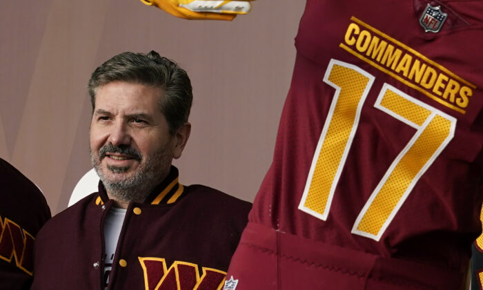 Washington Commanders' Dan Snyder poses for photos during an event to unveil the NFL football team's new identity, in Landover, Md., on Feb. 2, 2022.  (Patrick Semansky/AP Photo)