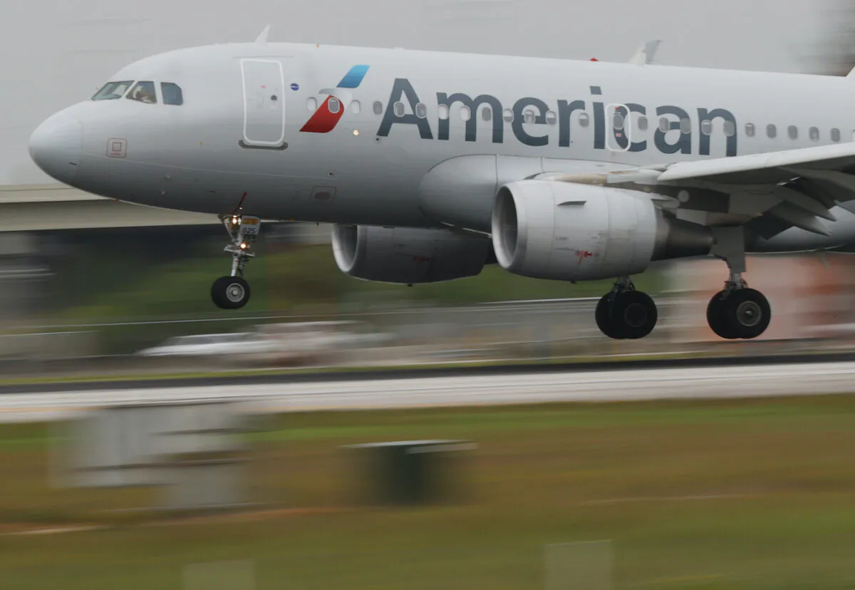 An American Airlines plane lands at the Miami International Airport on June 16, 2021. (Joe Raedle/Getty Images)