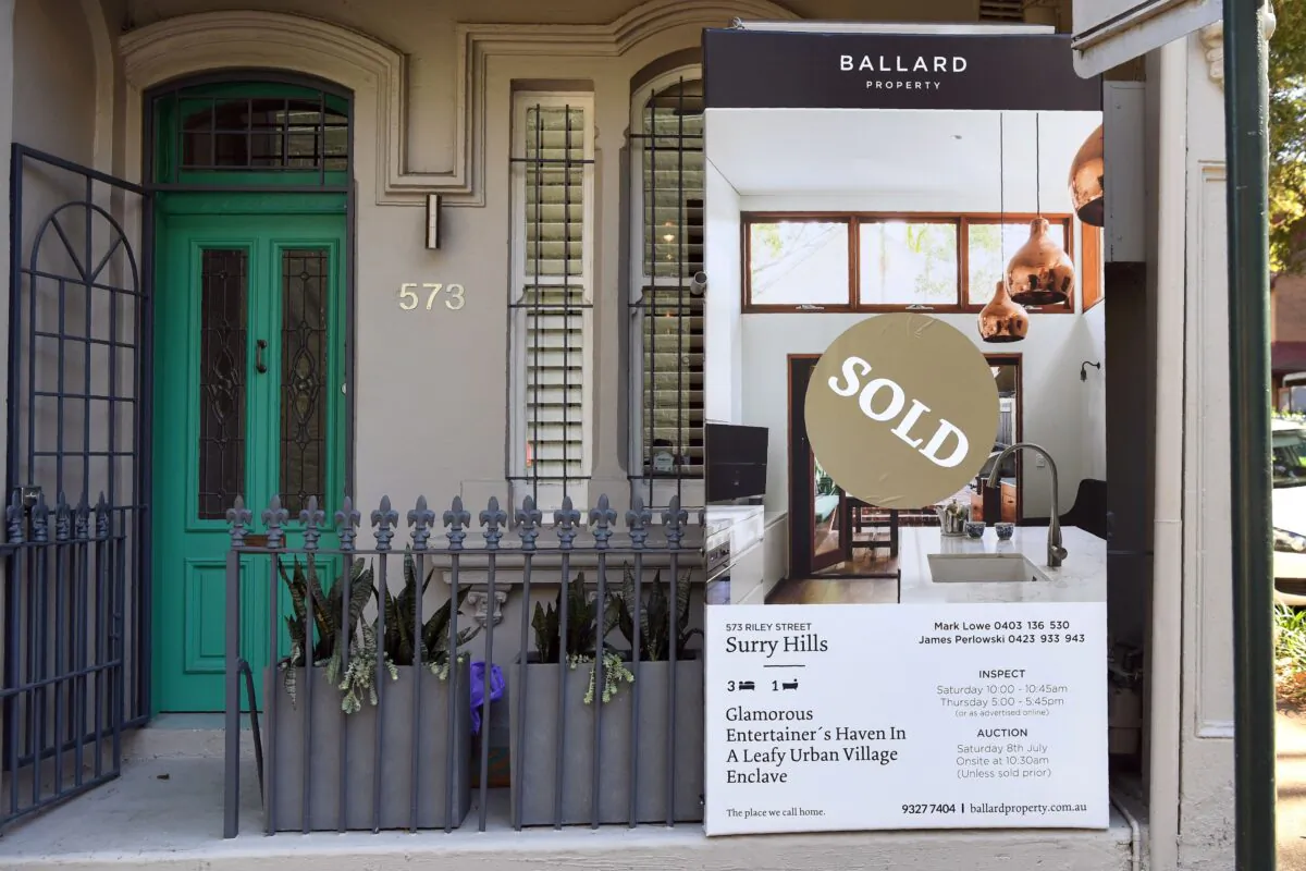 A sold sign on a real estate board advertising residential property in Sydney, Australia, on Aug. 1, 2017. (William West/AFP via Getty Images)