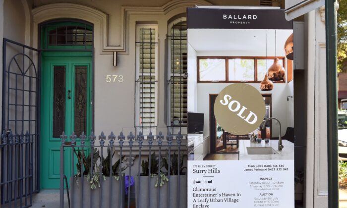 A sold sign on a real estate board advertising residential property in Sydney, Australia, on Aug. 1, 2017. (William West/AFP via Getty Images)