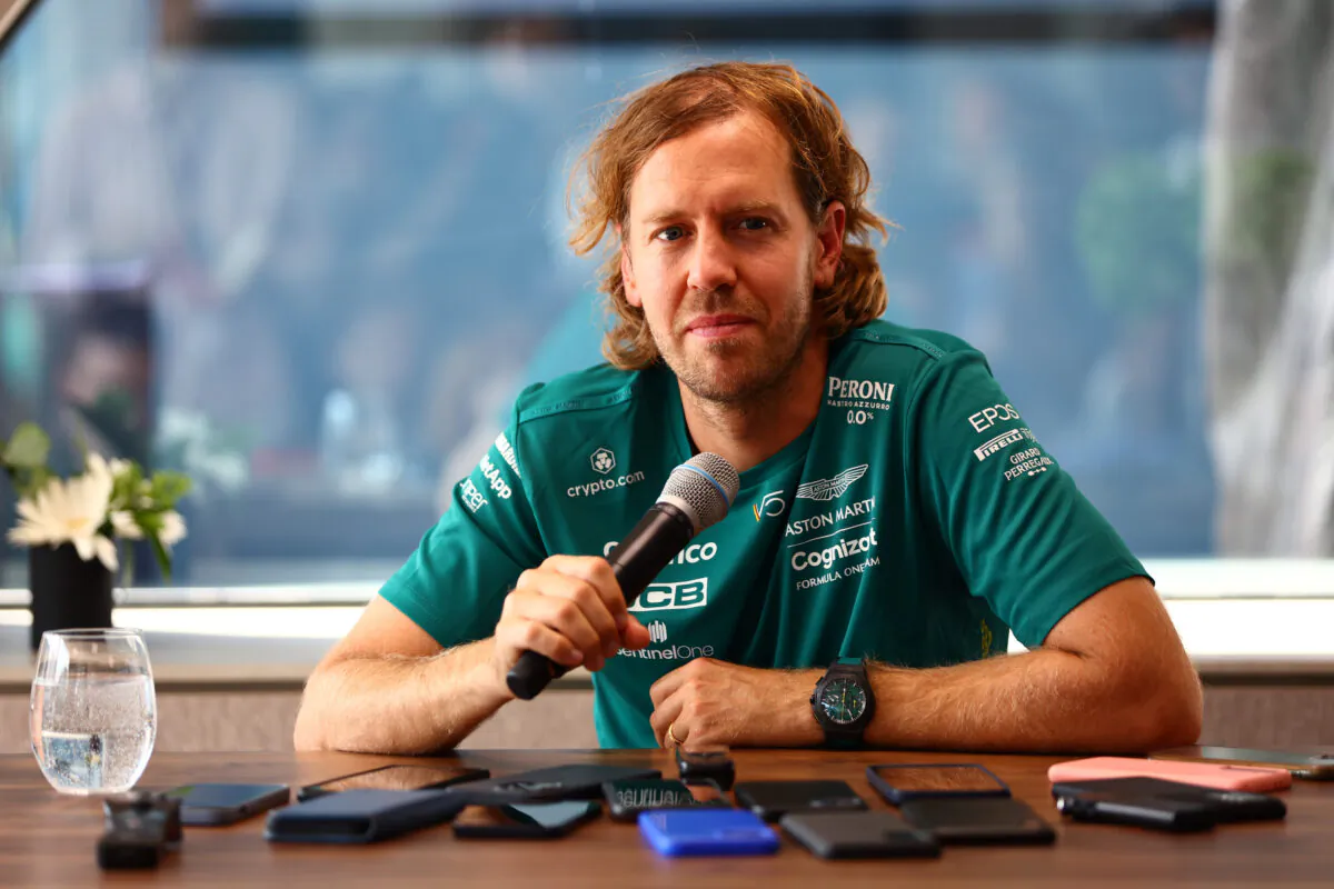 Sebastian Vettel of Germany and Aston Martin F1 Team talks to the media in the Paddock during previews ahead of the F1 Grand Prix of Hungary at Hungaroring, Hungary, on July 28, 2022. (Mark Thompson/Getty Images)