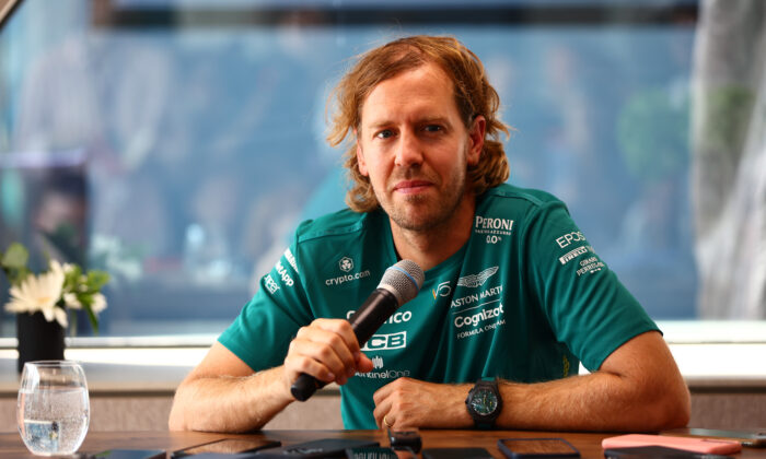 Sebastian Vettel of Germany and Aston Martin F1 Team talks to the media in the Paddock during previews ahead of the F1 Grand Prix of Hungary at Hungaroring, Hungary, on July 28, 2022. (Mark Thompson/Getty Images)