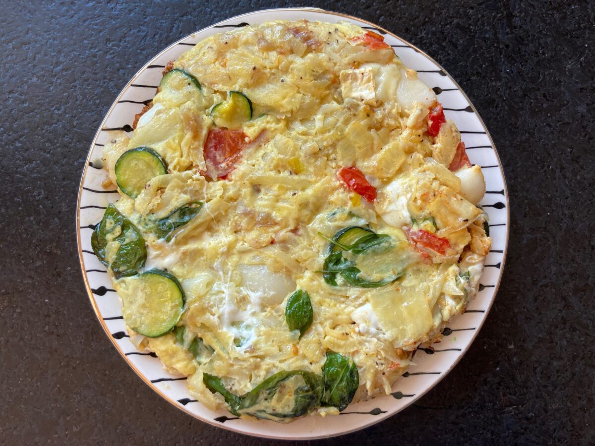 Tart tomatoes, chewy cheese, and aromatic basil give this frittata fireworks of flavor in every bite. (Ari LeVaux)