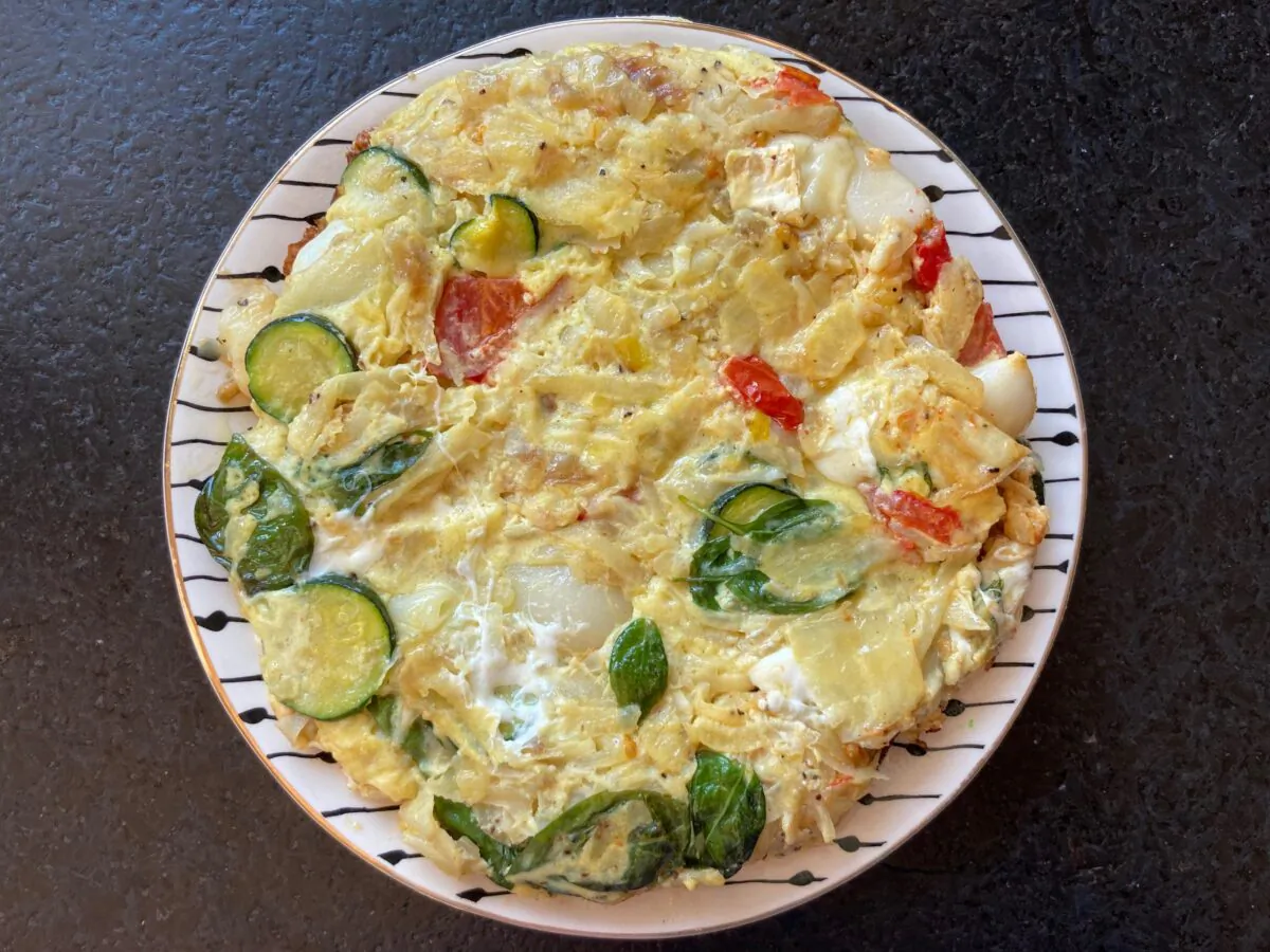 Tart tomatoes, chewy cheese, and aromatic basil give this frittata fireworks of flavor in every bite. (Ari LeVaux)