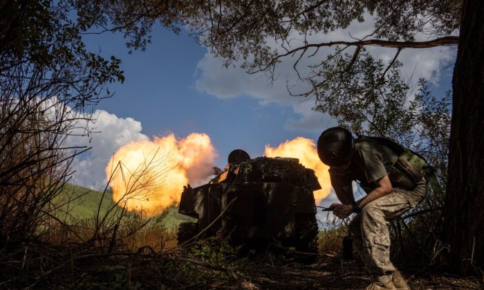 Ukrainian self-propelled artillery shoots towards Russian forces at a frontline in Kharkiv region, Ukraine, on July 27, 2022. (Evgeniy Maloletka/AP Photo)