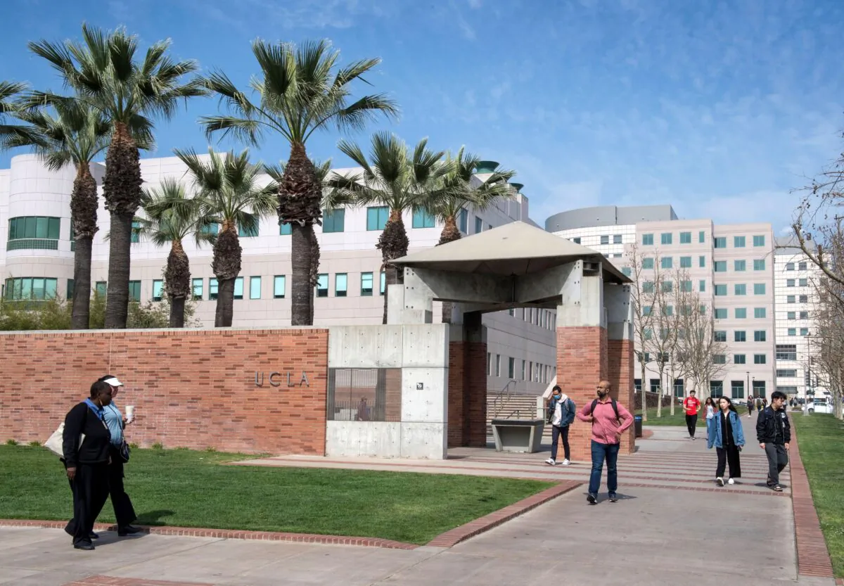 People walk through the campus of the UCLA college in Westwood, Calif., on March 6, 2020. (Mark Ralston/AFP via Getty Images)