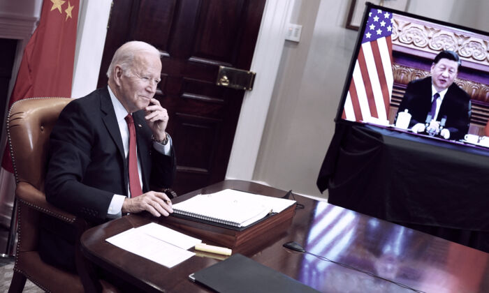 U.S. President Joe Biden meets with China's leader Xi Jinping during a virtual summit from the Roosevelt Room of the White House in Washington on Nov. 15, 2021. (Mandel Ngan/AFP via Getty Images)