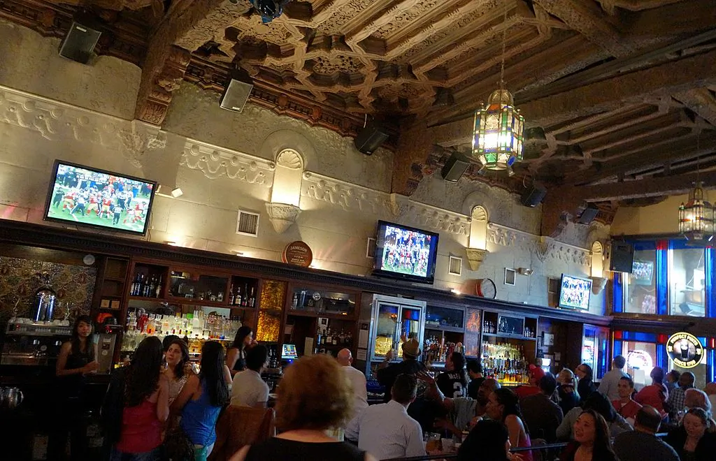 People watch Super Bowl XLVII, the San Francisco 49ers vs The Baltimore Ravens, on televisions in Hollywood's oldest restaurant and pub Pig'n Whistle in Hollywood, Calif., on Feb. 3, 2013. (Joe Klamar/AFP via Getty Images)