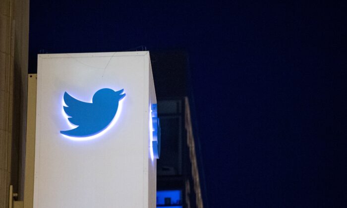 The Twitter logo is seen on a sign at the company's headquarters in San Francisco, California on Nov. 4, 2016. (Josh Edelson/AFP via Getty Images)