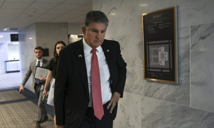 Sen. Joe Manchin (D-W.Va.) walks after a vote on the Women's Health Protection Act, at the Hart Senate Office Building in Washington, on May 11, 2022. (Kevin Dietsch/Getty Images)