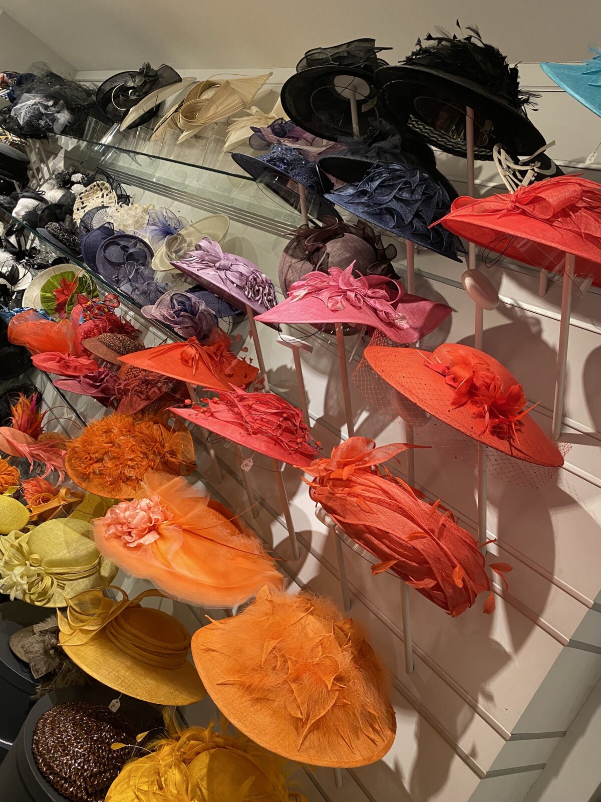 colorful hats at Suzanne Couture Milliner