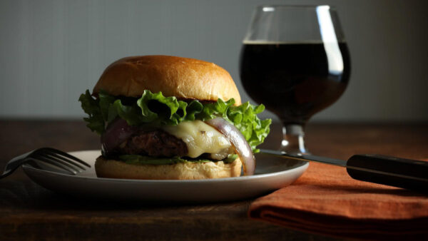 Avocado and Hatch Green Chile Cheeseburger on Brioche