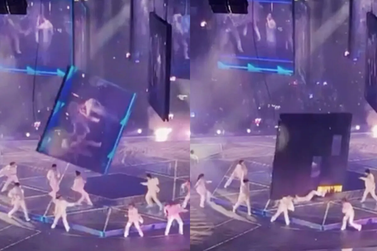 A Screenshot of a video capturing the moment when the TV screen fell and struck the dancers during MIRROR We Are Concert in Hong Kong on Jul 28, 2022. (Screenshot of a video by Big Mack/The Epoch Times)