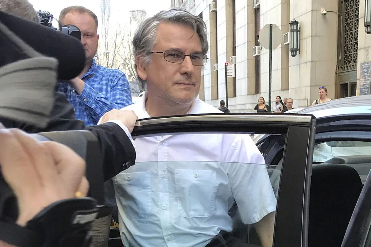 Dr. Ricardo Cruciani, a neurologist who admitted groping women at a Philadelphia clinic, leaves Manhattan state Supreme Court, in New York, on Feb. 21, 2018. (AP Photo/Colleen Long)