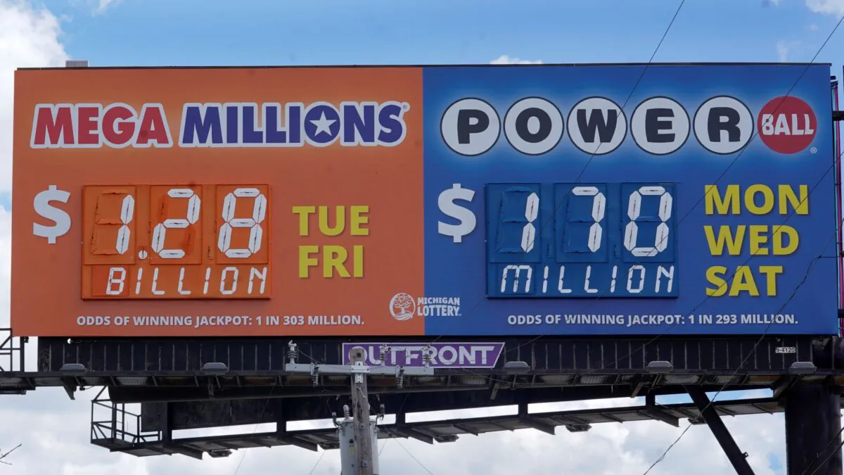 A sign displays the Mega Millions lottery jackpot in Detroit, Mich., on July 29, 2022. (Paul Sancya/AP Photo)