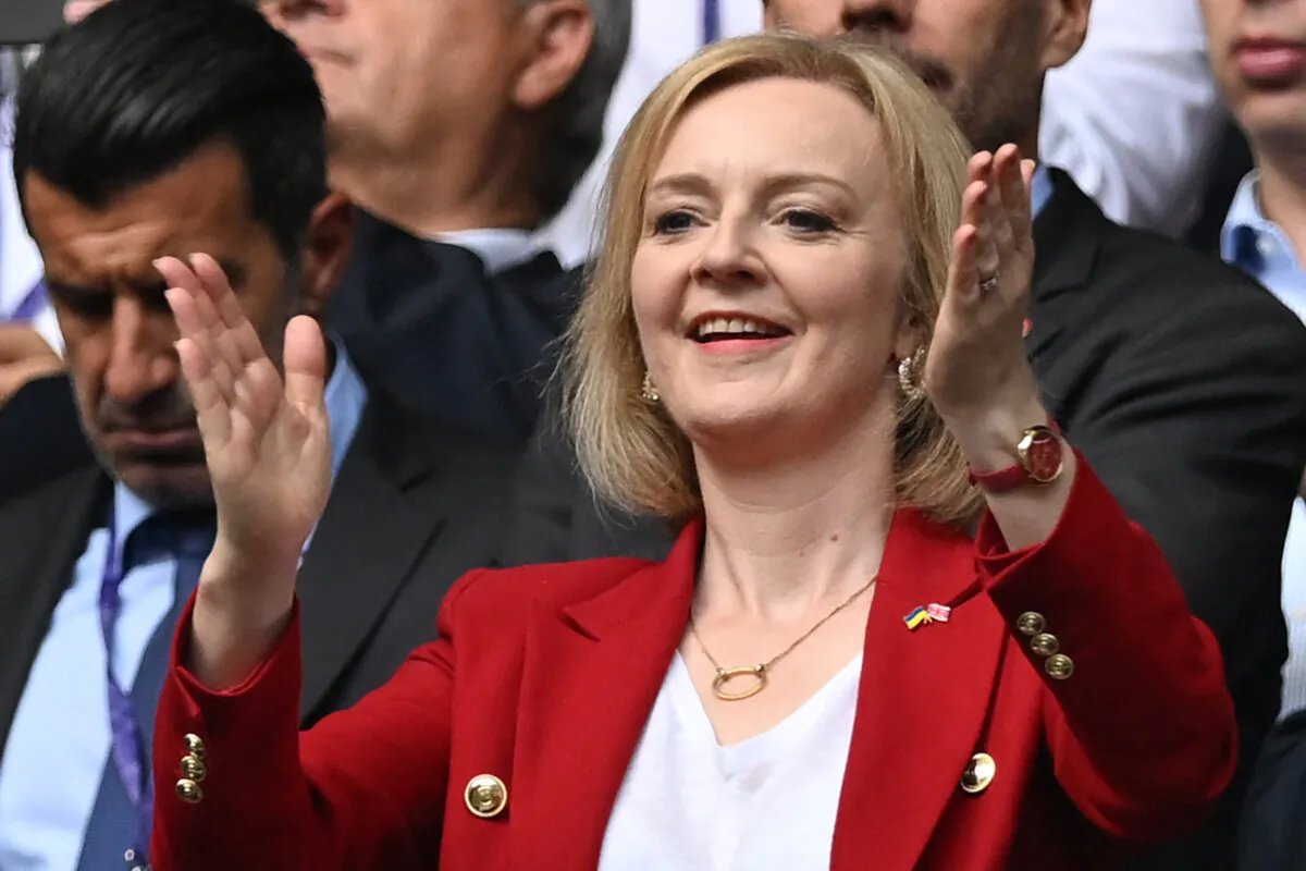 British Foreign Secretary Liz Truss cheers prior to the UEFA Women's Euro 2022 final football match between England and Germany at the Wembley stadium, in London, on July 31, 2022. (Justin Tallis/AFP via Getty Images)