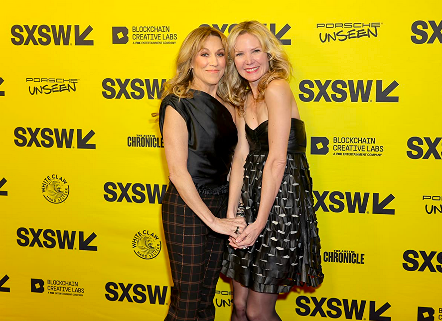 two women in front of yellow wall in "Sheryl."