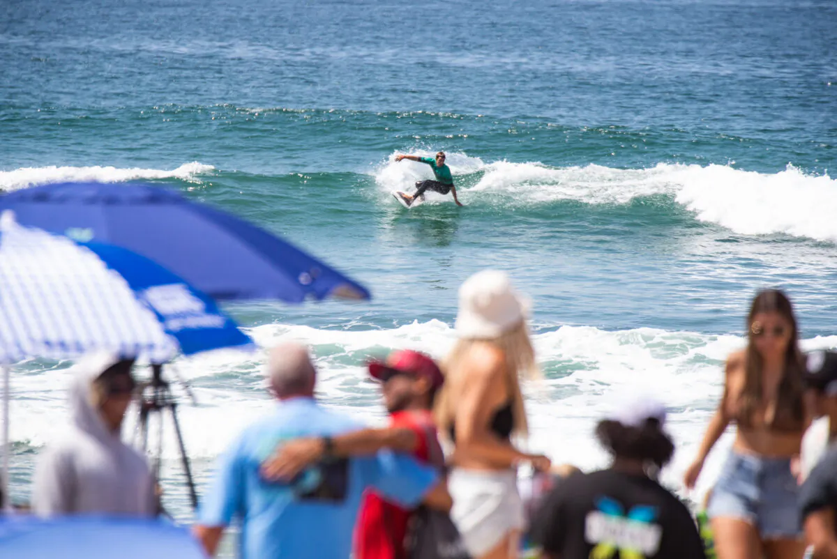 Thousands of people gather for the opening day of the Vans US Open of Surfing in Huntington Beach, Calif., on July 30, 2022. (John Fredricks/The Epoch Times)