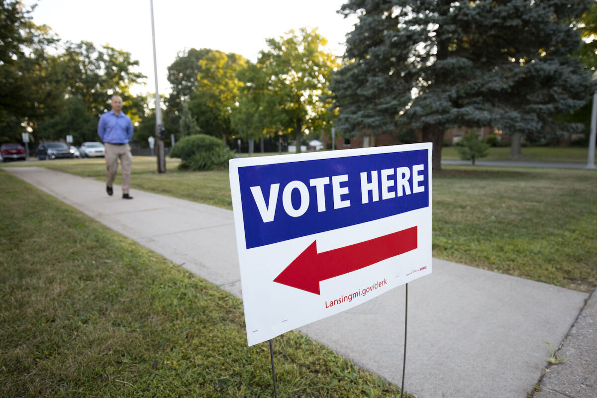 A voter arrives at a polling location to cast his ballot in the Michigan Pr...