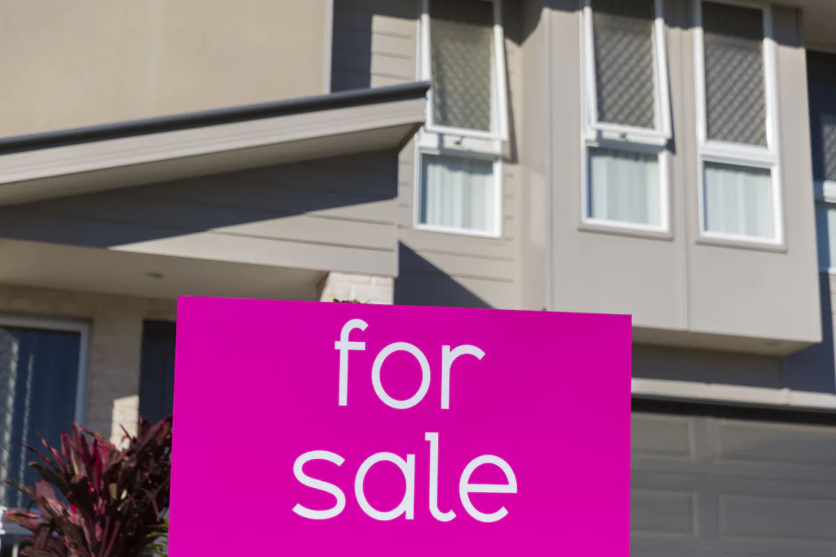 Property sales signage is displayed in North Lakes in Brisbane, Australia, on June 10, 2016. (Glenn Hunt/Getty Images)
