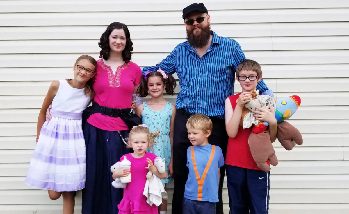 Katie and Ron Shier with their children. (Family Photo)