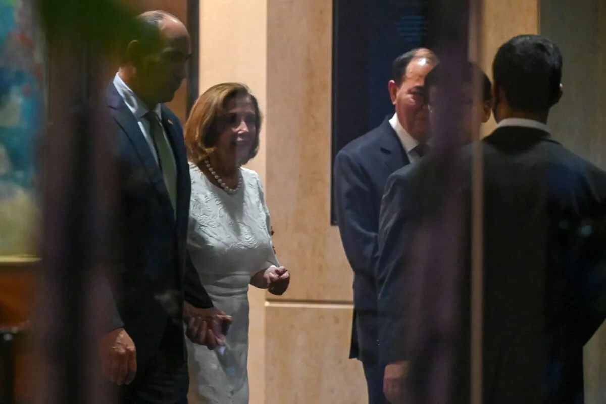 U.S. House Speaker Nancy Pelosi (D-Calif.) leaves the Shangri-La Hotel after a reception organised by the American Chamber of Commerce in Singapore on Aug. 1, 2022. (Roslan Rahman/AFP via Getty Images)