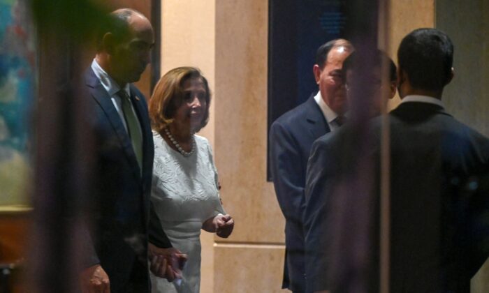 U.S. House Speaker Nancy Pelosi (D-Calif.) leaves the Shangri-La Hotel after a reception organised by the American Chamber of Commerce in Singapore on Aug. 1, 2022. (Roslan Rahman/AFP via Getty Images)