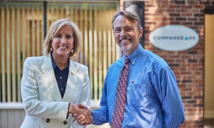 Rep. Claudia Tenney (R-N.Y.) and CompassCare CEO Rev. Jim Harden at the reopening of the CompassCare Pregnancy Services center in Amherst, N.Y., on Aug. 1, 2022. (Courtesy of CompassCare) 