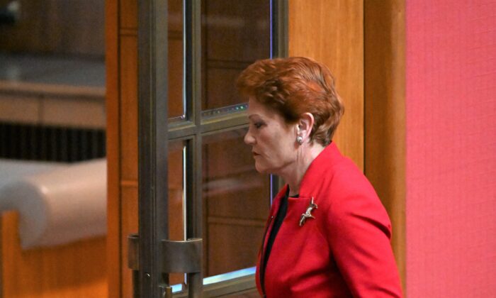 One Nation leader Pauline Hanson walks out after reacting to President Sue Lines's acknowledgement of country in the Senate chamber in Canberra, Australia, on July 27, 2022. (AAP Image/Mick Tsikas)