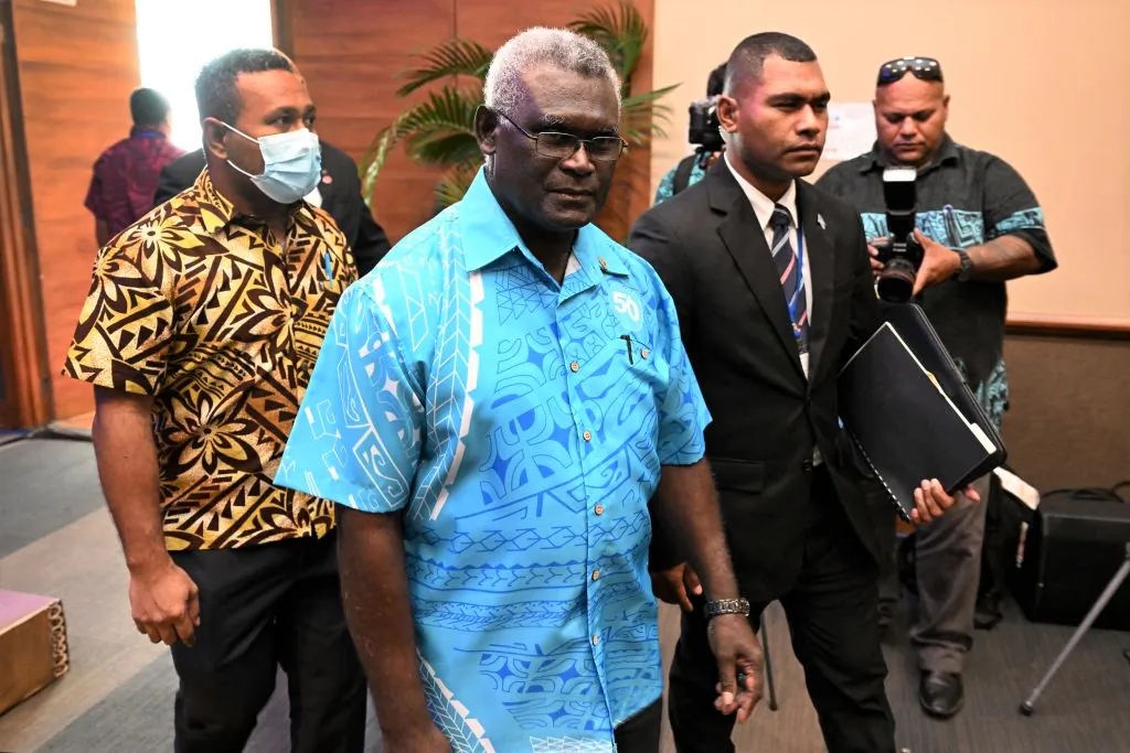 Prime minister of the Solomon Island Manasseh Sogavare (C) arrives for the opening remarks of Pacific Islands Forum (PIF) in Suva on July 12, 2022 (William West/AFP via Getty Images)