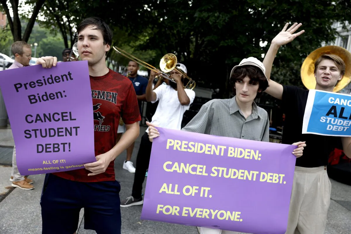 Activists rally outside the White House to call on President Joe Biden to cancel student loan debt on July 27, 2022. It turns out student loans cost taxpayers much more than the Government Accountability Office estimated. (Anna Moneymaker/Getty Images)