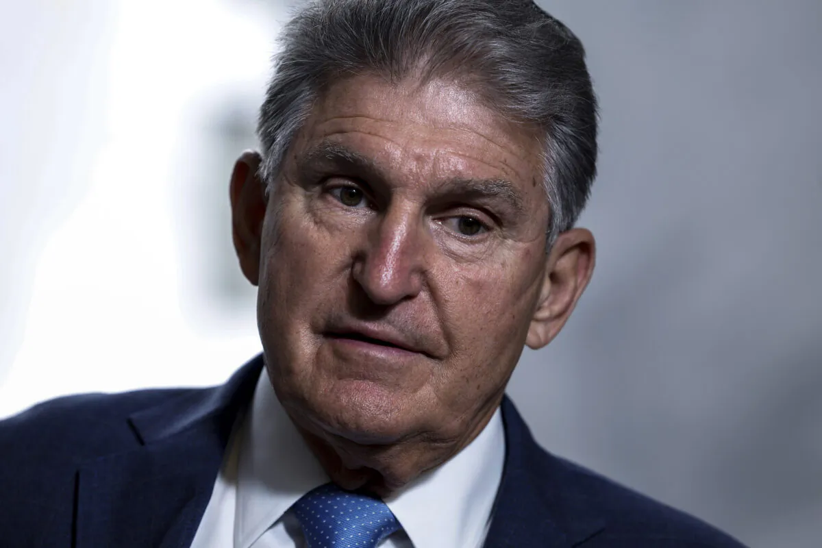 Sen. Joe Manchin (D-W.Va.) speaks to reporters in the Hart Senate Office building in Washington, D.C., on Aug. 1, 2022. (Anna Moneymaker/Getty Images)