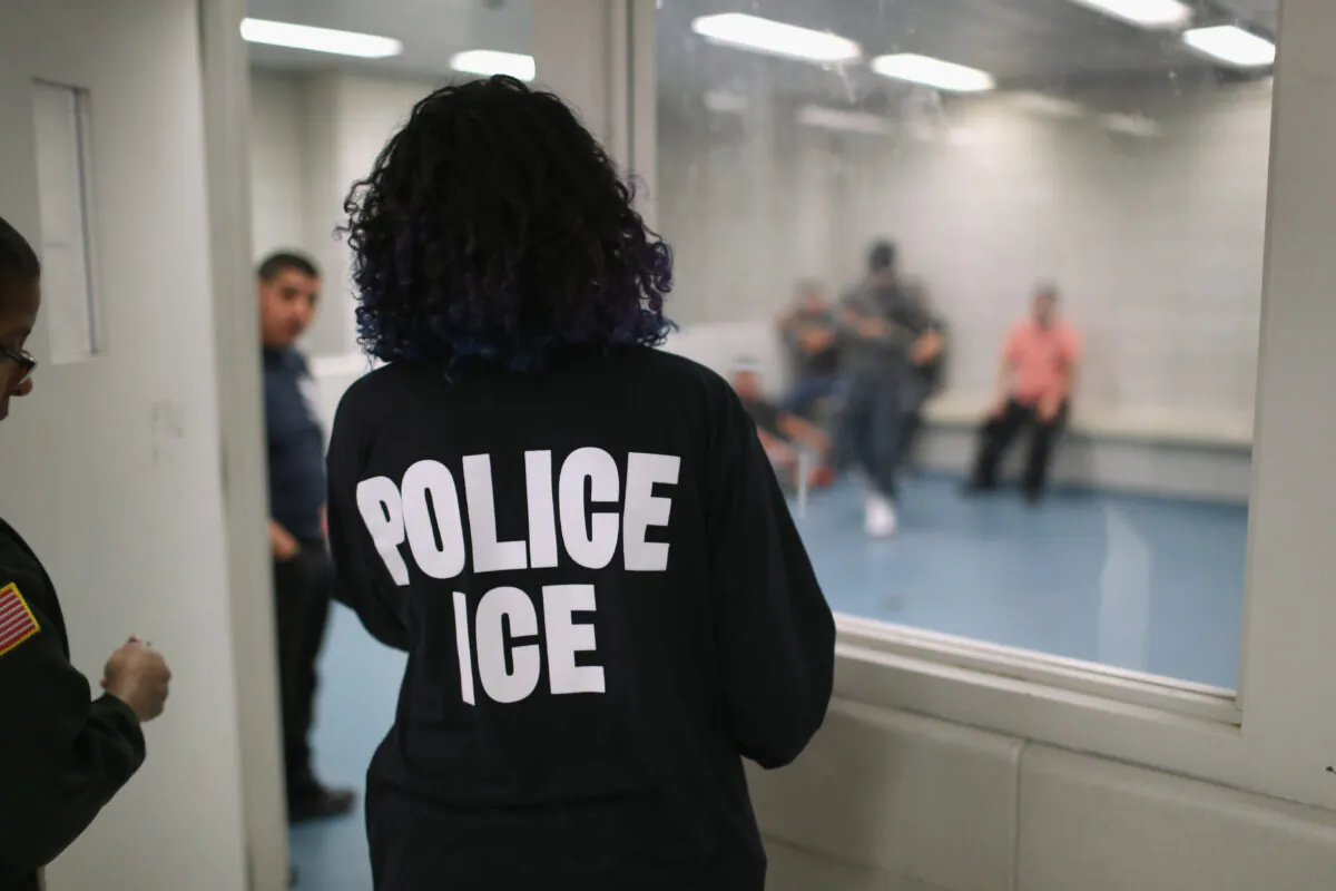 Illegal immigrants wait in a holding cell at a U.S. Immigration and Customs Enforcement (ICE) processing center on April 11, 2018. (John Moore/Getty Images)