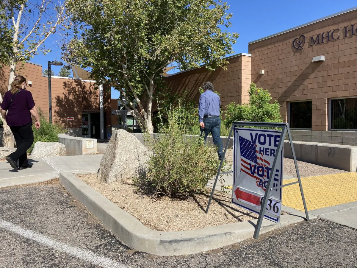 Voters enter a precinct polling place in Tucson, Ariz., on Election Day Aug. 2, 2022. (Allan Stein/The Epoch Times)