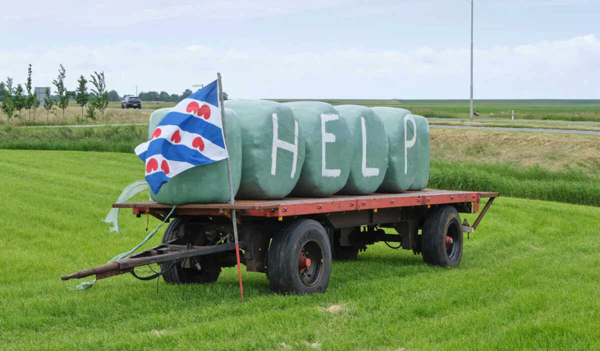 Farmers in the Netherlands protest against forced shrinking of livestock because of CO2 emissions, in Holwerd, Netherlands, on June 19, 2022. (Harry Wedzinga/Shutterstock)