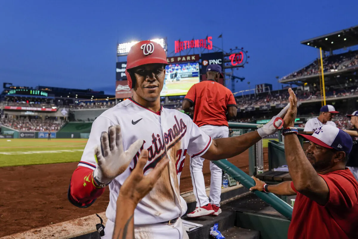 Washington Nationals' Juan Soto celebrates after his solo home run during the fourth inning of a baseball game against the New York Mets at Nationals Park in Washington, Monday, Aug. 1, 2022. (Alex Brandon/AP Photo)