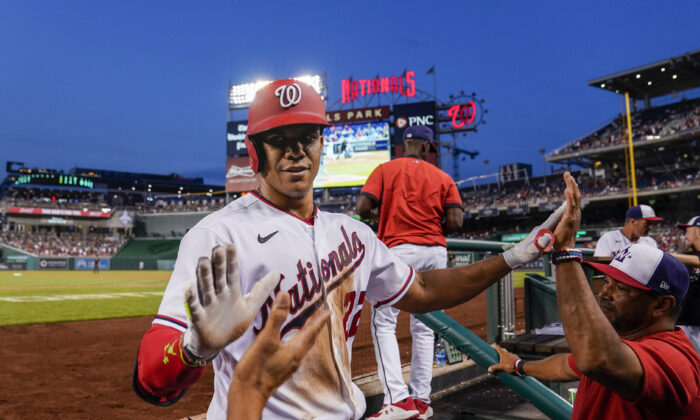Washington Nationals' Juan Soto celebrates after his solo home run during the fourth inning of a baseball game against the New York Mets at Nationals Park in Washington, Monday, Aug. 1, 2022. (Alex Brandon/AP Photo)