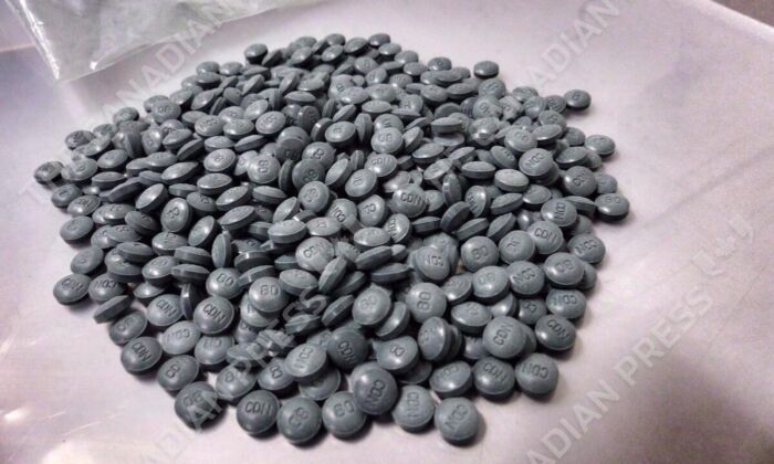 Fentanyl pills are shown in an undated police handout photo. (The Canadian Press/HO/Alberta Law Enforcement Response Teams (ALERT))
