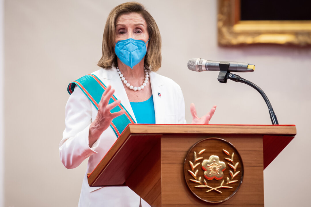 House Speaker Nancy Pelosi (D-Calif.) speaks after receiving the Order of Propitious Clouds with Special Grand Cordon, Taiwan’s highest civilian honor, from Taiwan's President Tsai Ing-wen, at the president's office in Taipei, Taiwan, on Aug. 3, 2022. (Handout/Getty Images)