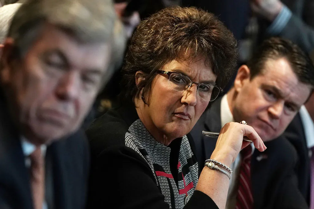 (L-R) US Sen. Roy Blunt (R-Mo.), Rep. Jackie Walorski (R-Ind.), and Sen. Todd Young (R-Ind.) listen during a meeting between President Donald Trump and congressional members in the Cabinet Room of the White House in Washington on Feb. 13, 2018. (Alex Wong/Getty Images)
