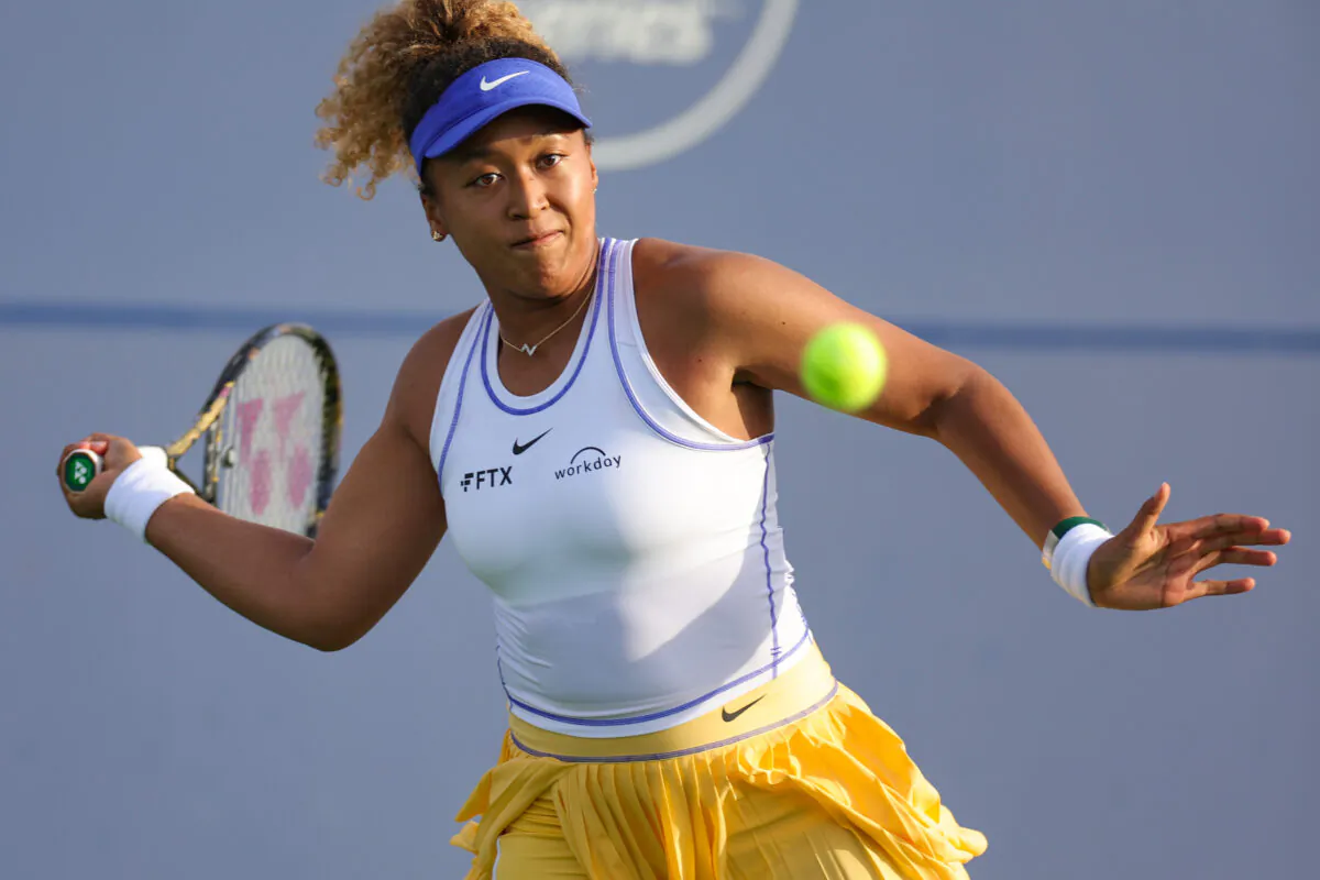 Naomi Osaka of Japan returns a shot from Qinwen Zheng of China during the Mubadala Silicon Valley Classic, part of the Hologic WTA Tour, at Spartan Tennis Complex in San Jose, Calif. on Aug. 2, 2022. (Carmen Mandato/Getty Images)