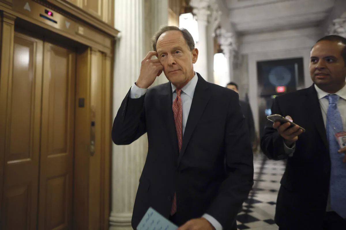 Sen. Pat Toomey (R-Pa.) heads into the Senate chamber at the U.S. Capitol in Washington on June 23, 2022. (Chip Somodevilla/Getty Images)