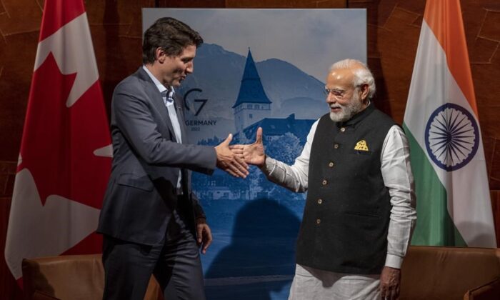 Prime Minister Justin Trudeau and Indian Prime Minister Narendra Modi shake hands prior to a bilateral meeting at the G7 summit in Schloss Elmau, Germany, on June 27, 2022. (Paul Chiasson/The Canadian Press)