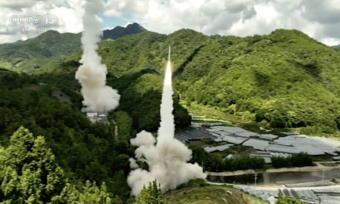 A missile is launched from an unspecified location in China on Aug. 4, 2022. The Chinese military fired missiles into waters near Taiwan as part of its planned exercises on Aug. 4. (CCTV via AP)