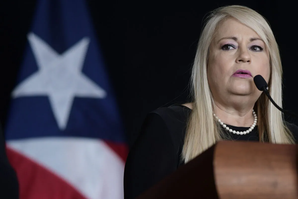 Puerto Rico Gov. Wanda Vazquez gives a press conference to announce the extension of the COVID-19 curfew, while detailing the new sectors of the country that may resume operations, as part of a new executive order in San Juan, Puerto Rico, on May 21, 2020. (Carlos Giusti/AP Photo)