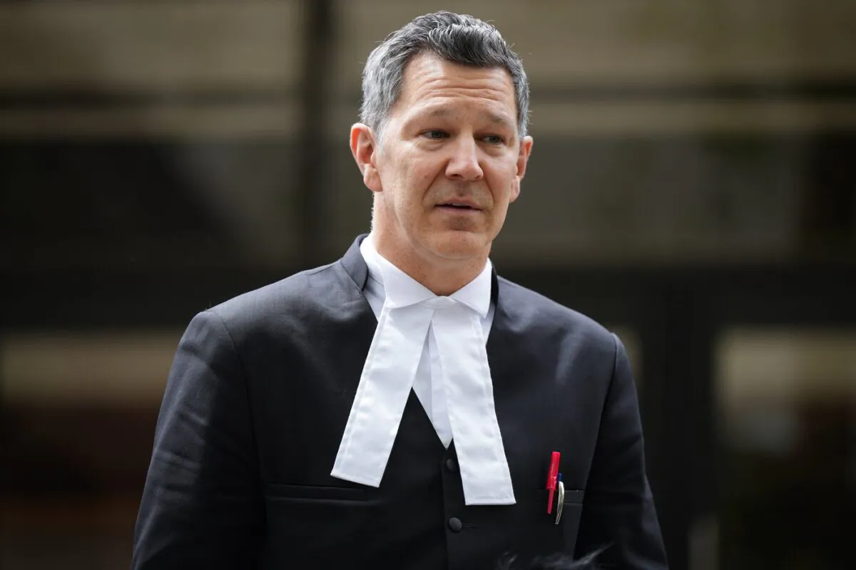 Aydin Coban's lawyer Joe Saulnier pauses while responding to questions outside B.C. Supreme Court, in New Westminster, B.C., on June 6, 2022. (The Canadian Press/Darryl Dyck)