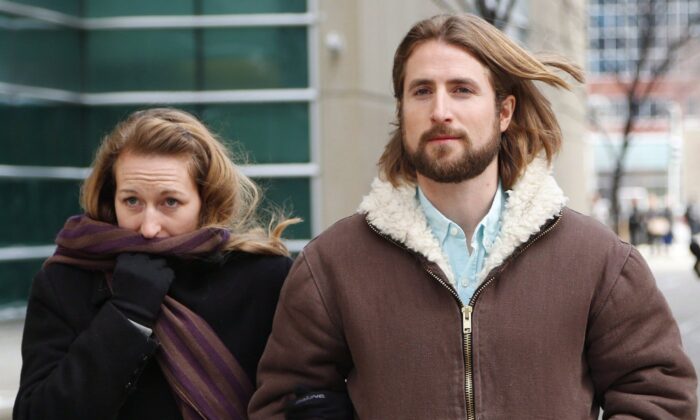 David and Collet Stephan leave for a break during their appeals trial in Calgary, on March 9, 2017. (The Canadian Press/Todd Korol)